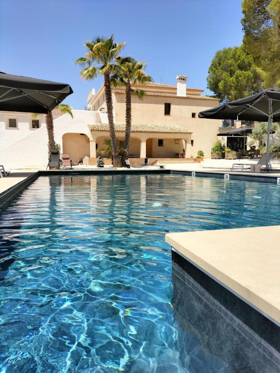 Hotel Finca La Mixtura, Restaurant Melange Онтиниент Екстериор снимка